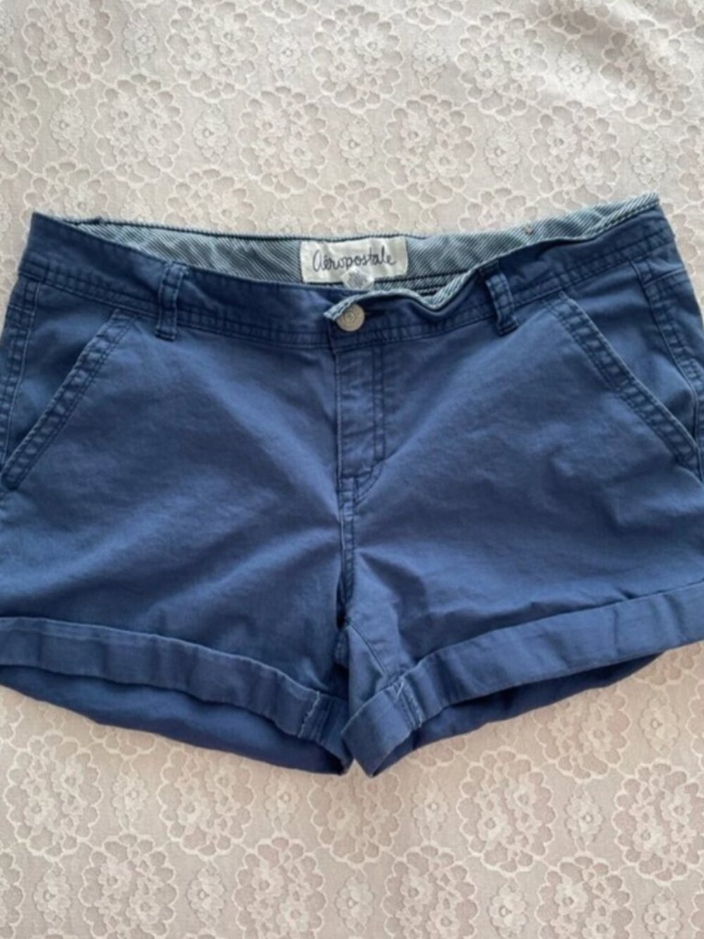 blue midi rise shorts